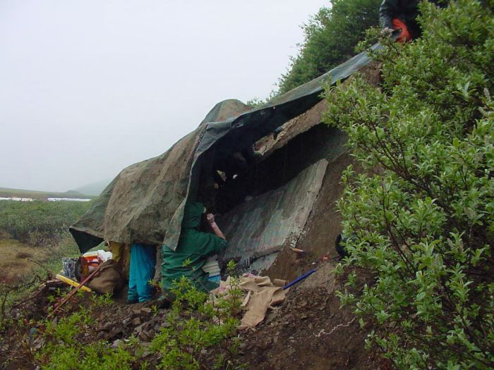 A mixture of rain, ice, and snow required the placement of a tarp as a temporary shelter.