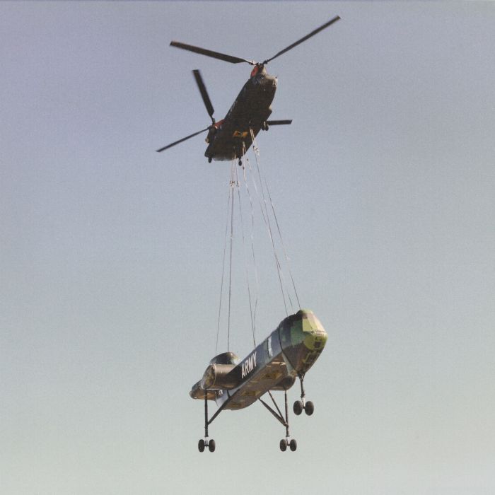 A Boeing CH-47C Chinook, tail number unknown, transports the Heavy Lift Helicopter (HLH) mockup to the aviation museum at Fort Rucker, Alabama.