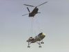 View a CH-47C lifting the mockup of the HLH helicopter on it's way to the museum at Fort Rucker.