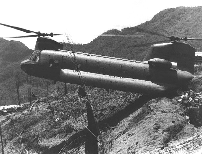 67-18472 conducting an aft gear landing on a pinnacle while delivering cargo in the Republic of Vietnam.