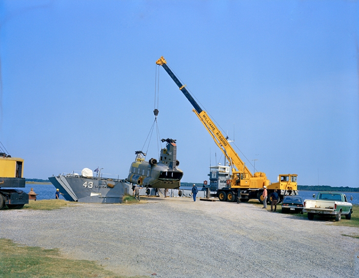 1973: A crane offloads CH-47C Chinook helicopter 67-18542 from a barge. The aircraft was transported from Fort Eustis, Virgina, and was destined for destruction as part of the crash testing conducted in support of the U.S. Army by the National Aeronautics and Space Administration (NASA).