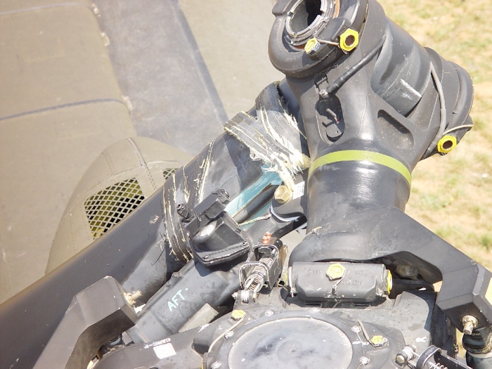 July 2002: Without the droop stops engaged and the dampner firmly attached, an aft rotor blade will make contact with the fuselage during engine shutdown and cause extensive damage.