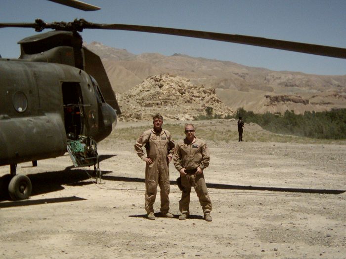 89-00142 and crew pose for a shot that includes one of the old fortresses used by Genghis Kahn.