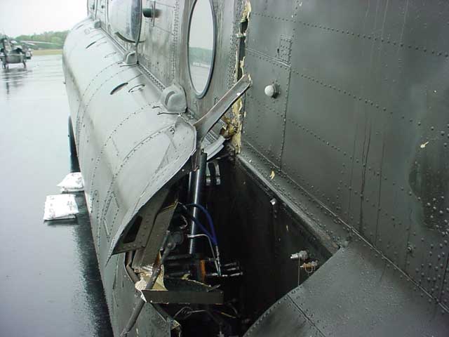 Boeing CH-47D Chinook 91-00233 at the accident site showing the damage caused by the swashplate failure.