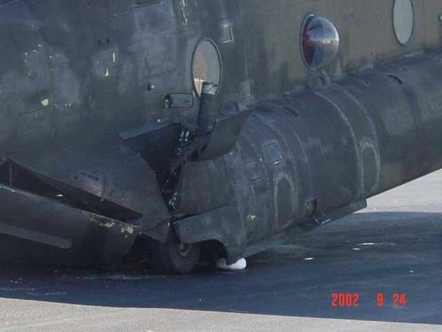 Boeing CH-47D Chinook 91-00233 at the accident site showing the damage caused by the swashplate failure.