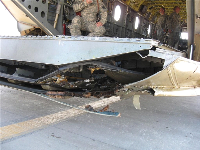 On an unknown date somewhere in Afghanistan, CH-47F Chinook helicopter 05-08015 received a hit from an RPG causing damage to the aft section of the aircraft.