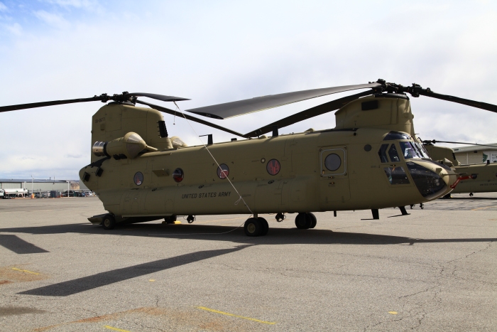 12 April 2012: CH-47F Chinook helicopter 08-08771 sits broken on the ramp at Billings, Montana. The Number One Engine Control Unit (ECU) displayed a D1 code during the prestart checks. Unfortunately, this was an Abort Mission code and 771 would get left behind while the other three aircraft continued to Helena.