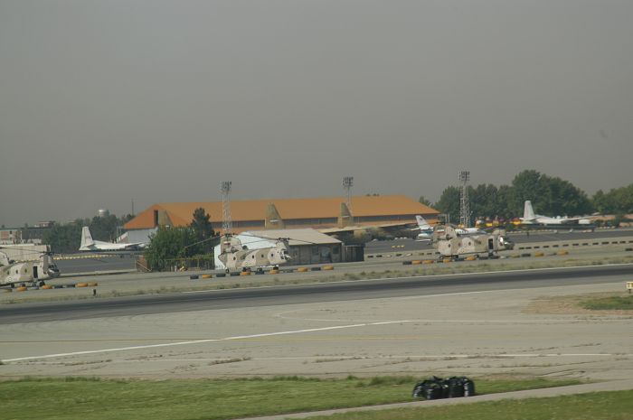 Three Iranian CH-47C Chinooks are parked on the ramp at Tehran's Mehrabad airport.