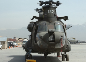 11 April 2001: During phase maintenance,  CH-47 Chinook helicopter xx-xx182 gets dismantled and thoroughly checked for mechanical and structural deficiencies at Bagram Air Base. Click-N-Go Here to view a larger version of this image [266 Kb].