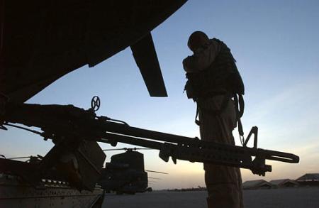 A crewmember from the 101st Airborne Division readies himself for a misssion.