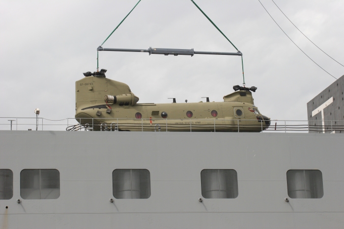 18 November 2010: CH-47F Chinook helicopter 07-08743 was the first to come off the ship via the center cargo hole.