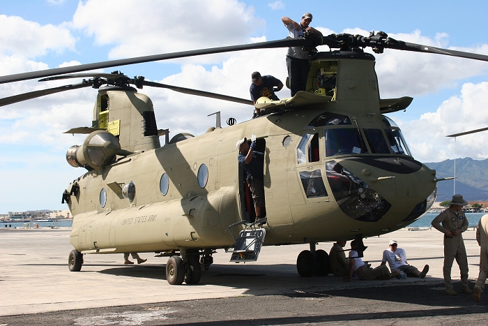 20 November 2010: CH-47F Chinook helicopter 09-08067 gets some final maintenance during reassembly on the dock at Pearl Harbor.