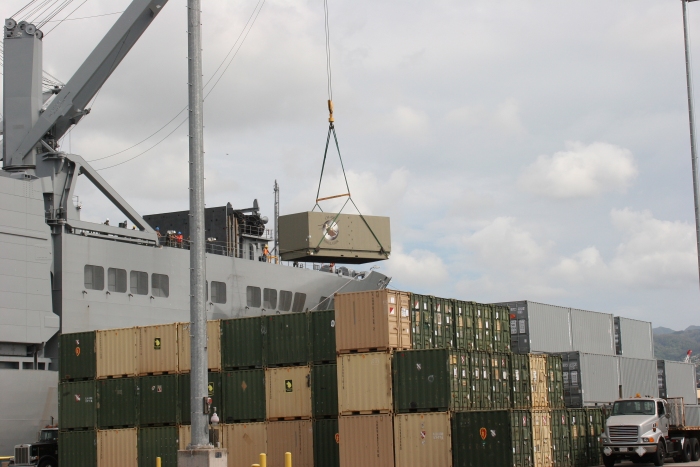 18 November 2010: A CH-47F Chinook helicopter Simulator was unloaded from the forward cargo hole of the USNS Mendonca.