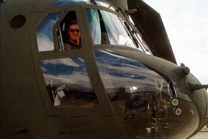 U.S. Army First Lieutenant Brian Slavenas is shown inside of a Chinook helicopter in this undated family photo. Lt. Slavenas was one of the pilots of the U.S. Army Chinook helicopter that was shot down in Falluja, Iraq.