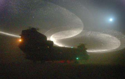 British Royal Marines from C-Company 40 Commando board chinook helicopters from 18 Squadron Royal Air Force.