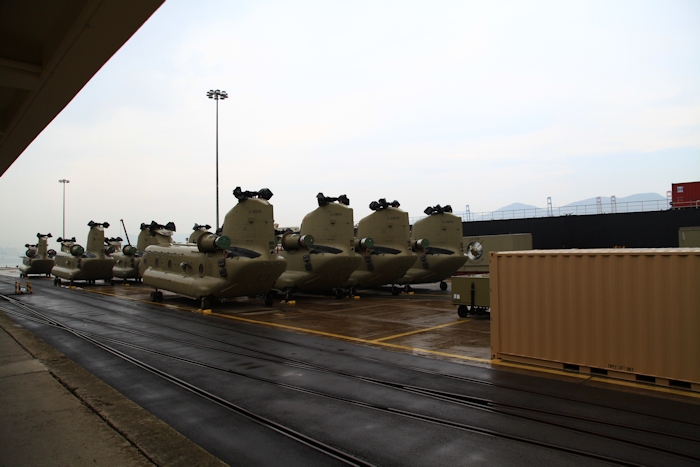 3 November 2013: The CH-47F Chinook helicopter fleet destined for Camp Humphreys sits in the rain on Pier 8 in Busan, Republic of Korea.